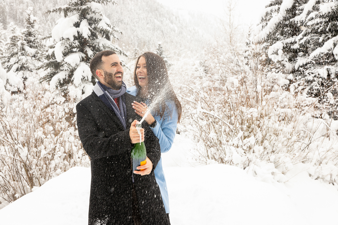 Aspen Carriage and Sleigh snowy Aspen, CO surprise proposal sleigh ride winter blue coat engagement diamond ring Crested Butte photographer Gunnison photographers Colorado photography - proposal engagement elopement wedding venue - photo by Mountain Magic Media