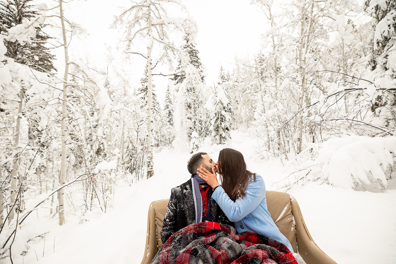 Aspen Carriage and Sleigh snowy Aspen, CO surprise proposal sleigh ride winter blue coat engagement diamond ring Crested Butte photographer Gunnison photographers Colorado photography - proposal engagement elopement wedding venue - photo by Mountain Magic Media