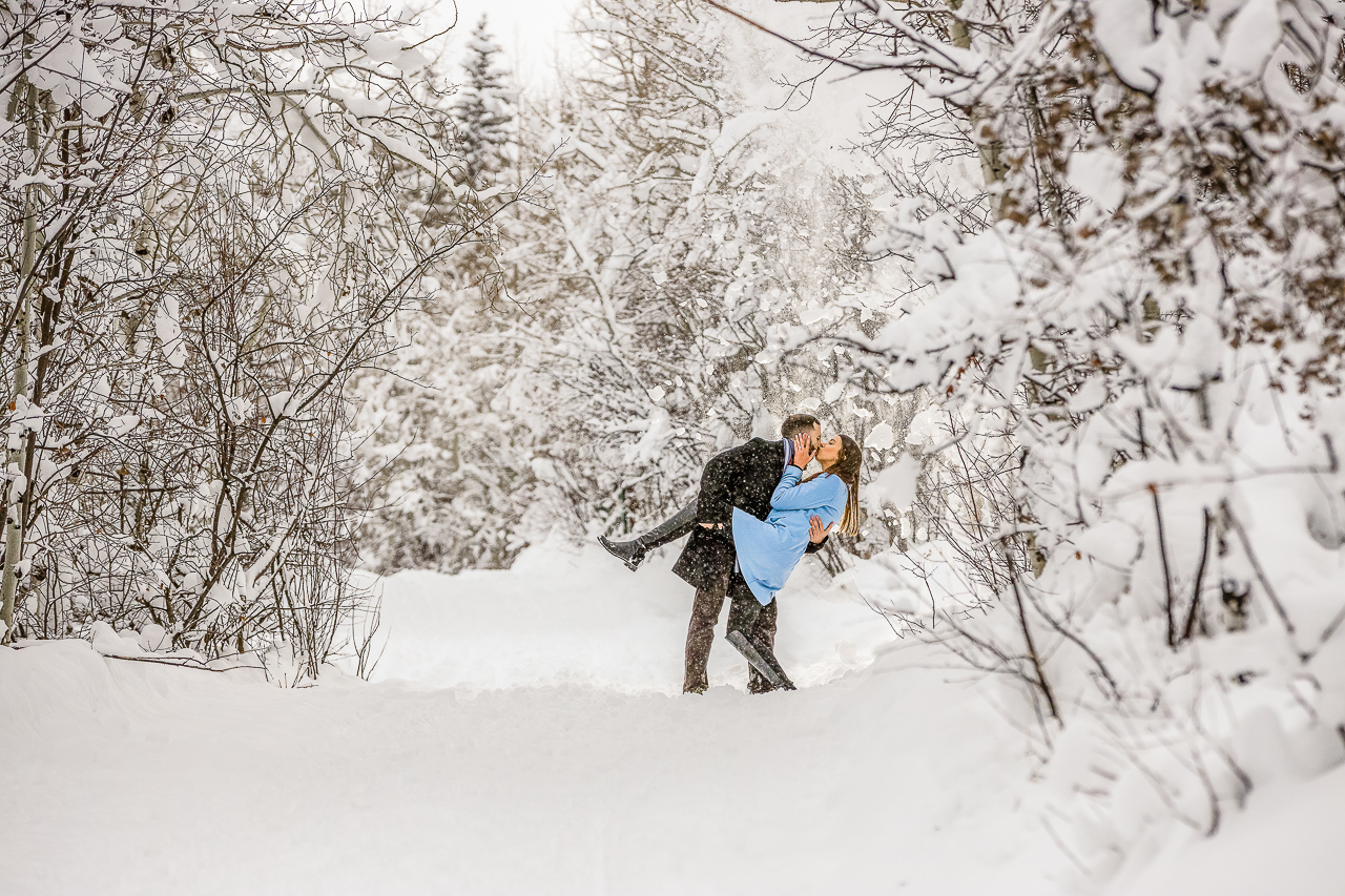 Aspen Carriage and Sleigh snowy Aspen, CO surprise proposal sleigh ride winter blue coat engagement diamond ring Crested Butte photographer Gunnison photographers Colorado photography - proposal engagement elopement wedding venue - photo by Mountain Magic Media