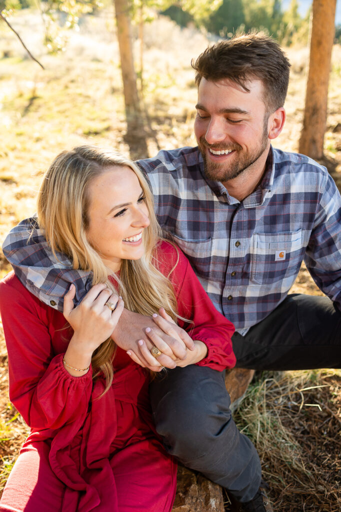 cute couple smiling Crested Butte photographer Gunnison photographers Colorado photography - proposal engagement elopement wedding venue - photo by Mountain Magic Media