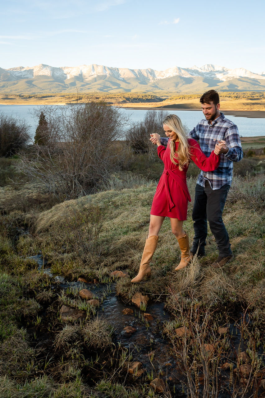 cute couple smiling Taylor Park Reservoir Crested Butte photographer Gunnison photographers Colorado photography - proposal engagement elopement wedding venue - photo by Mountain Magic Media