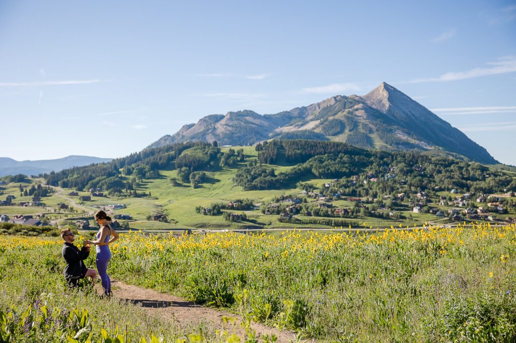 Snodgrass proposal champagne spray Crested Butte photographer Gunnison photographers Colorado photography - proposal engagement elopement wedding venue - photo by Mountain Magic Media