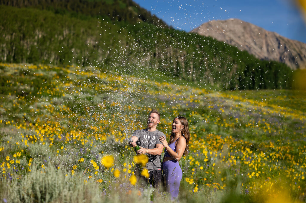 Snodgrass proposal champagne spray Crested Butte photographer Gunnison photographers Colorado photography - proposal engagement elopement wedding venue - photo by Mountain Magic Media