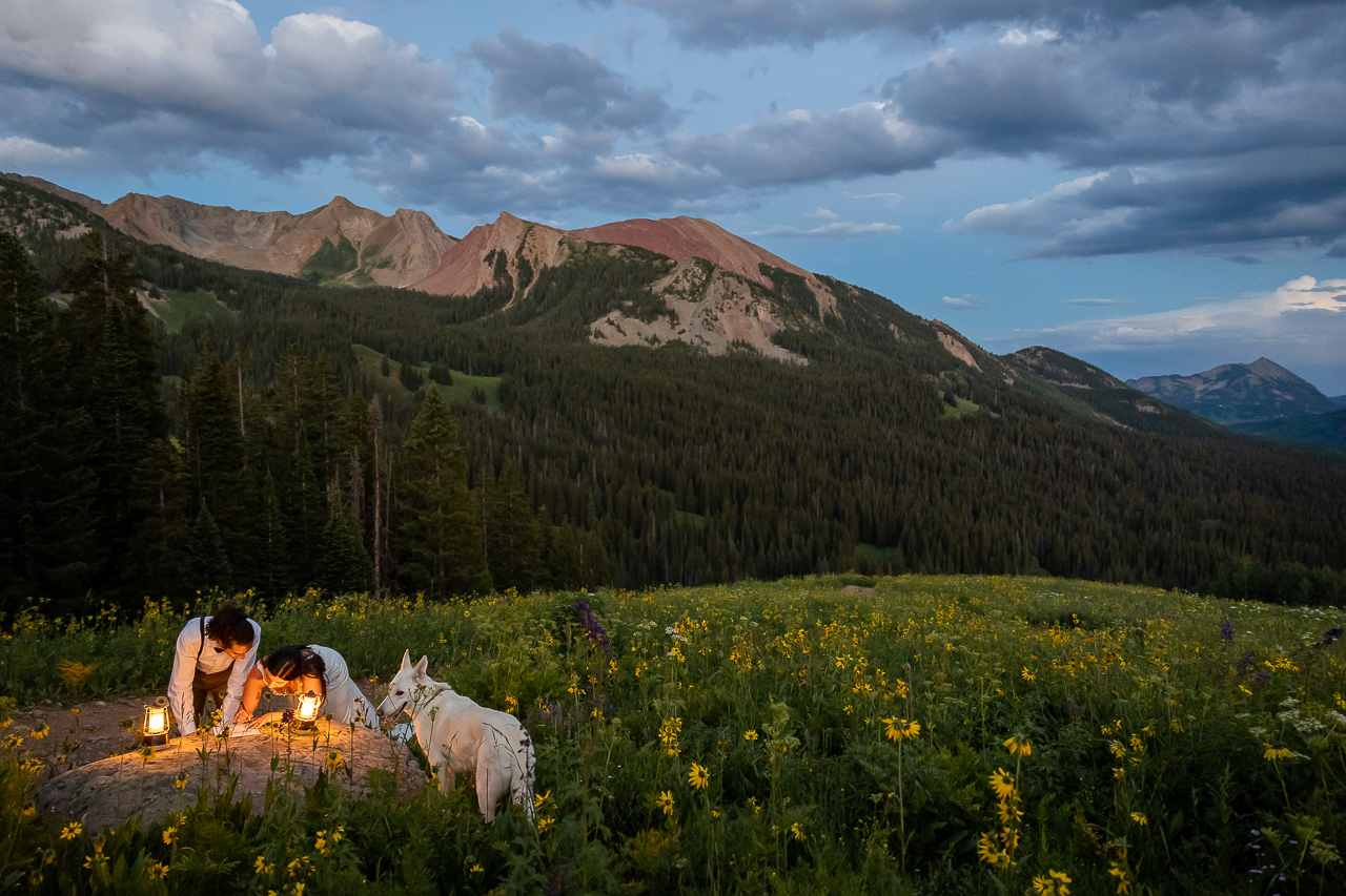 signing marriage license after dark with lanterns on a rock Crested Butte photographer Gunnison photographers Colorado photography - proposal engagement elopement wedding venue - photo by Mountain Magic Media