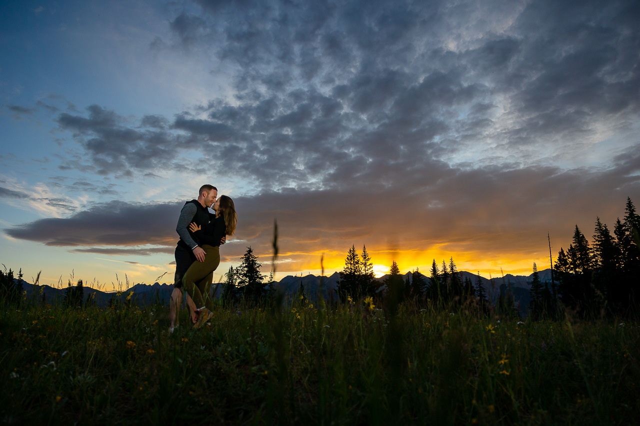 surprise proposal sunrise kiss romantic lift couple Crested Butte photographer Gunnison photographers Colorado photography - proposal engagement elopement wedding venue - photo by Mountain Magic Media