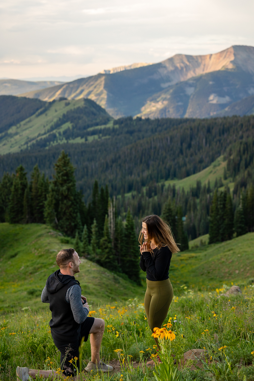 surprise proposal sunrise kiss romantic lift couple Crested Butte photographer Gunnison photographers Colorado photography - proposal engagement elopement wedding venue - photo by Mountain Magic Media