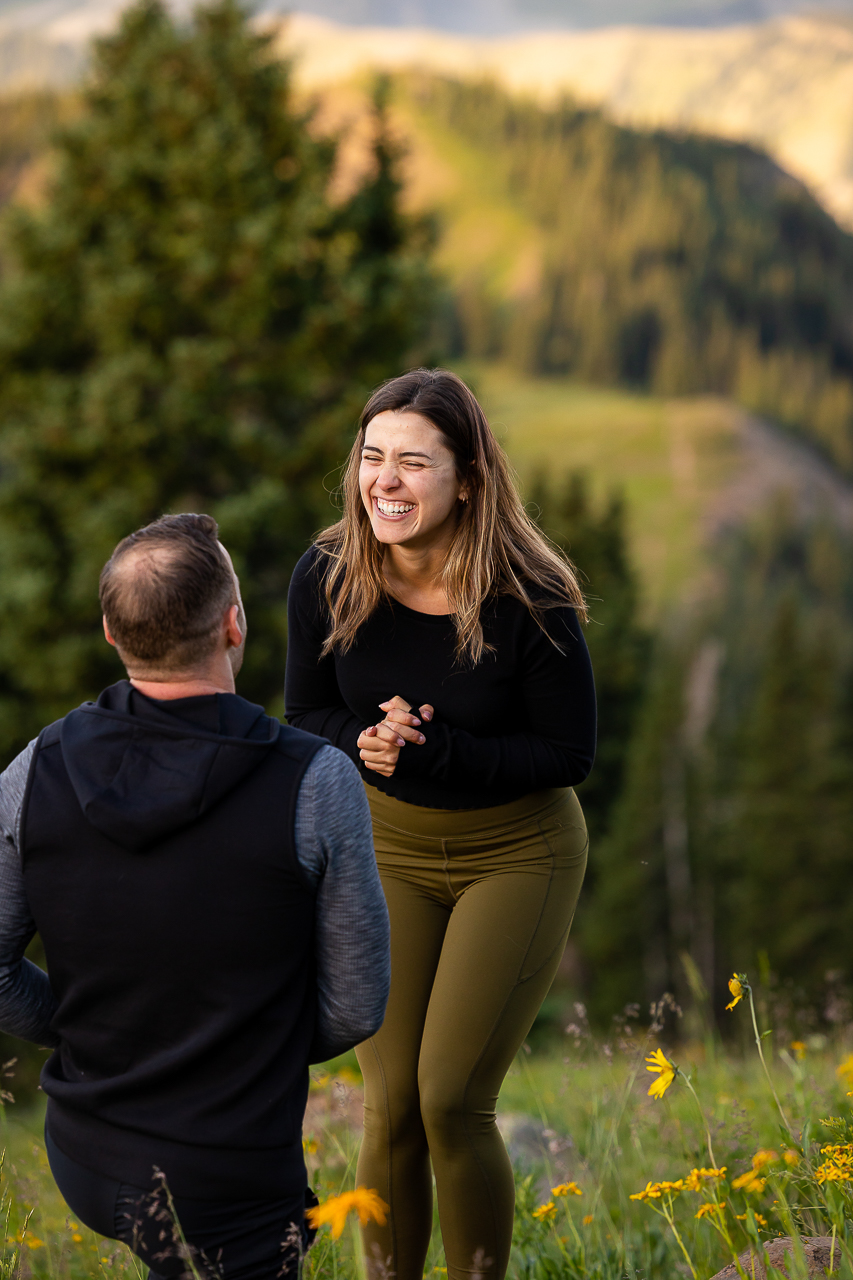 surprise proposal sunrise kiss romantic lift couple Crested Butte photographer Gunnison photographers Colorado photography - proposal engagement elopement wedding venue - photo by Mountain Magic Media