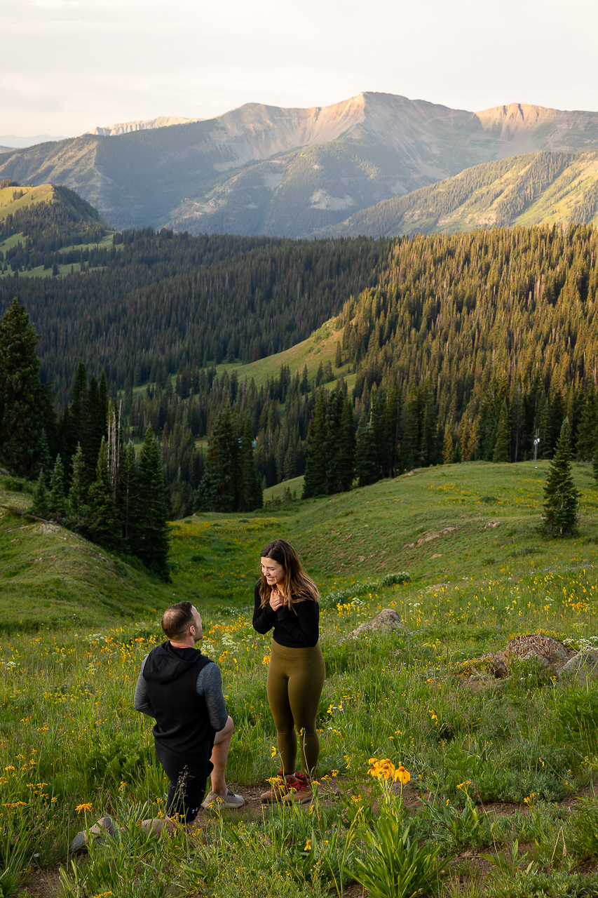 surprise proposal sunrise kiss romantic lift couple Crested Butte photographer Gunnison photographers Colorado photography - proposal engagement elopement wedding venue - photo by Mountain Magic Media