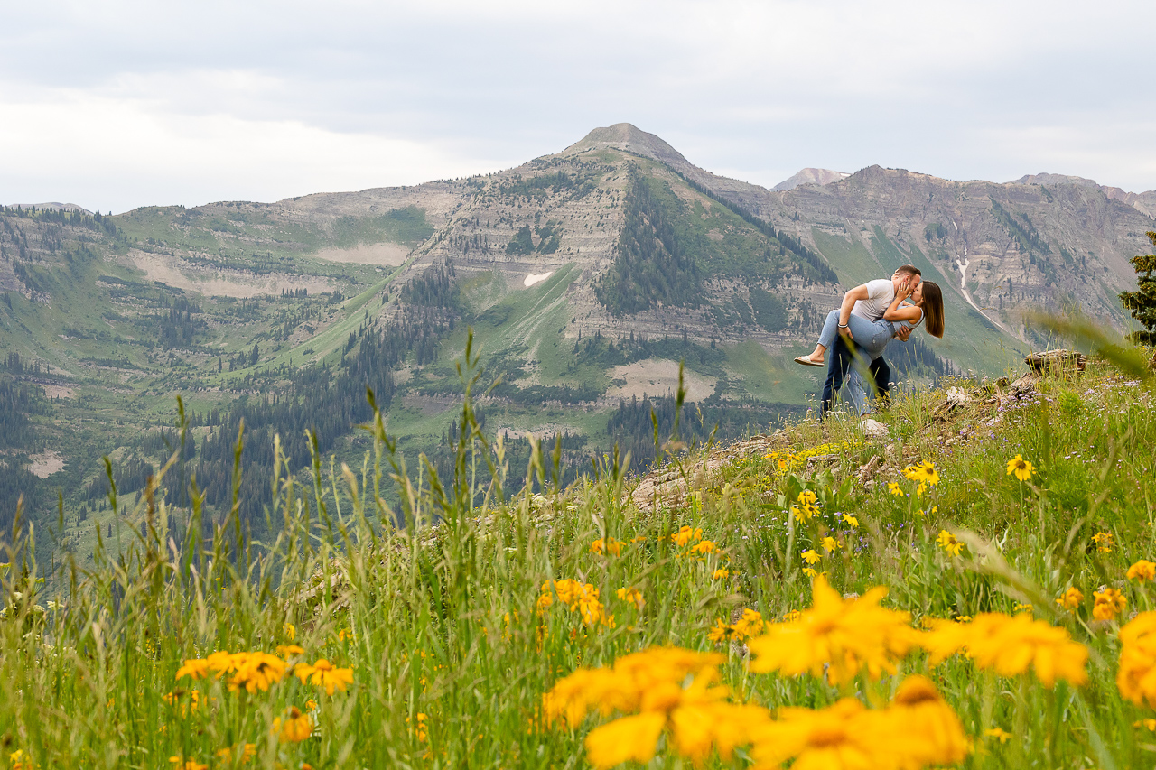 wildflowers wildflower festival yellow sunflowers couple kissing newly engaged Crested Butte photographer Gunnison photographers Colorado photography - proposal engagement elopement wedding venue - photo by Mountain Magic Media