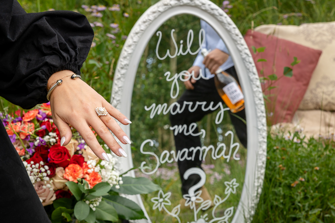 will you marry me sign custom signage for surprise proposals mirror floral bouquet flowers champagne Crested Butte photographer Gunnison photographers Colorado photography - proposal engagement elopement wedding venue - photo by Mountain Magic Media