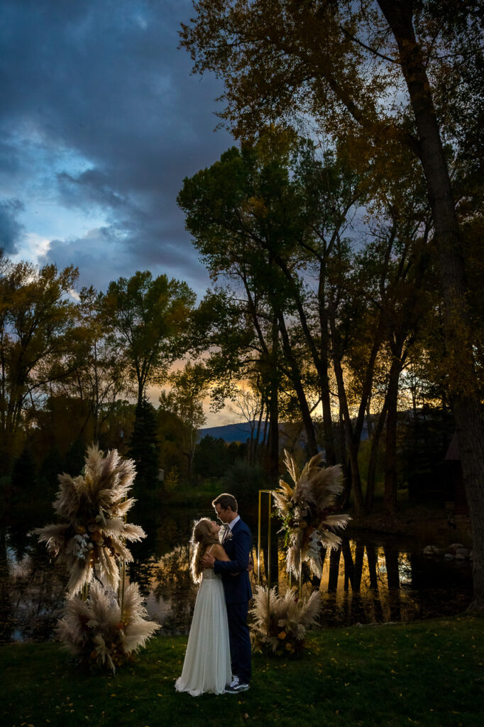 sunset pampas grass boho bride and groom backyard wedding -Durango-Colorado-wedding-photographer-elopement-photography-proposal-photos-engagement-photographers-photo-by-Mountain-Magic-Media