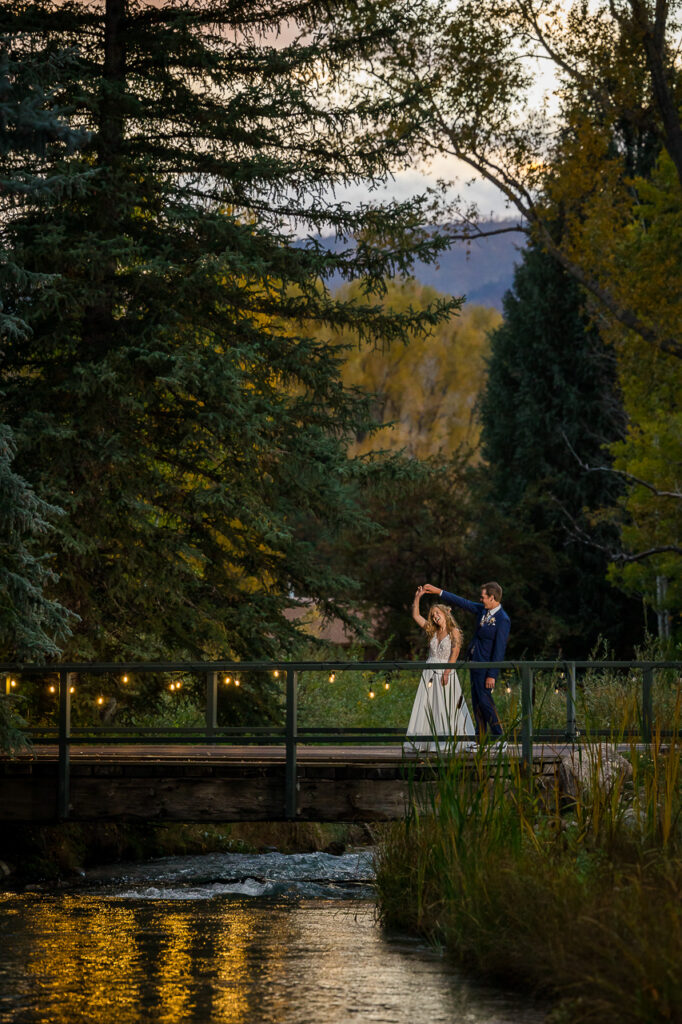 dancing on bridge -Durango-Colorado-wedding-photographer-elopement-photography-proposal-photos-engagement-photographers-photo-by-Mountain-Magic-Media