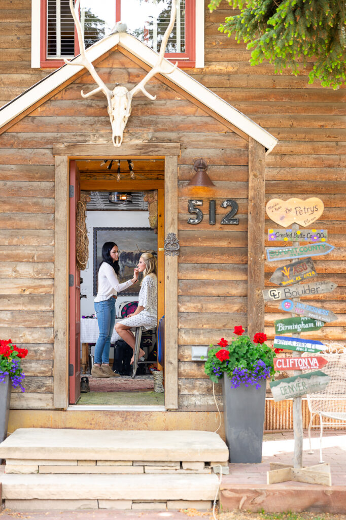 Town Ranch Wedding makeup artist looking through the door Crested Butte photographer Gunnison photographers Colorado photography - proposal engagement elopement wedding venue - photo by Mountain Magic Media
