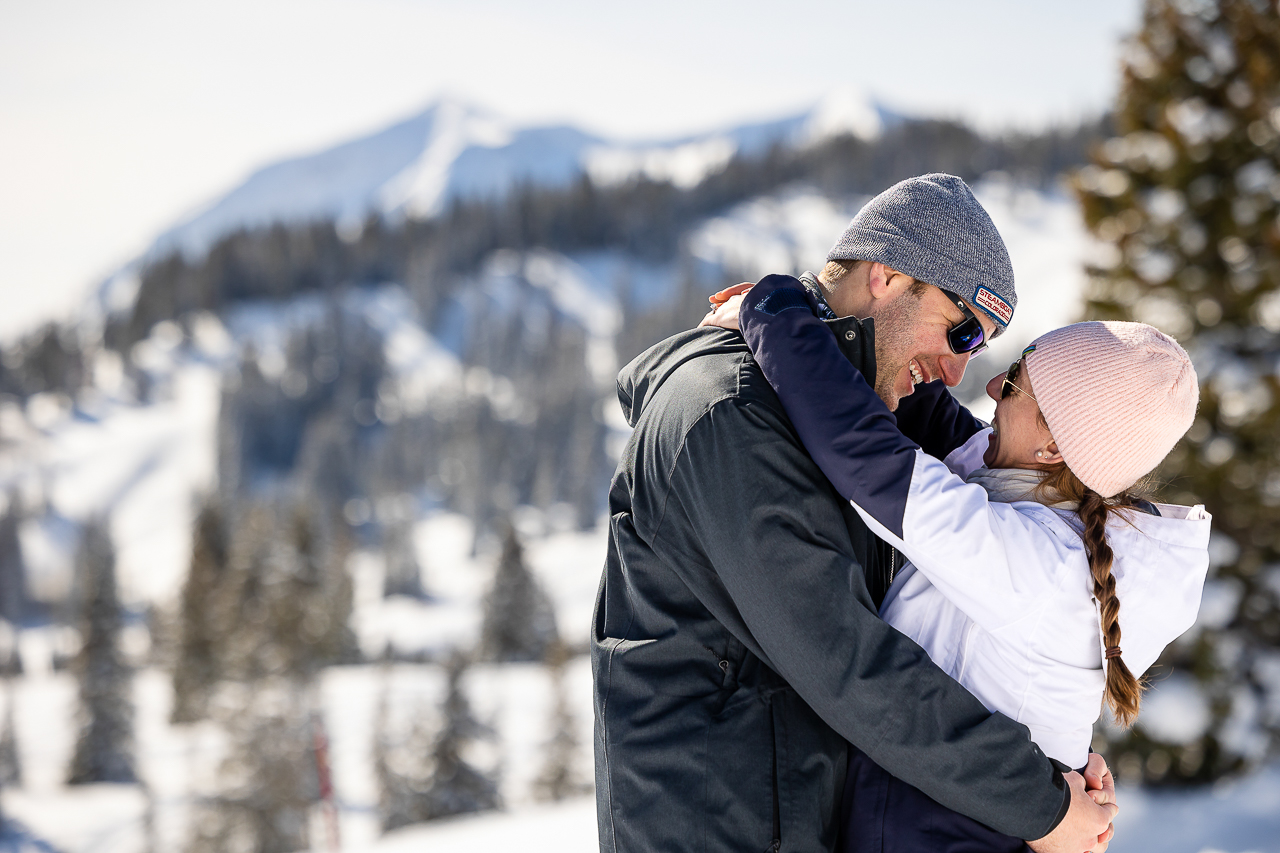 snowy winter excitement surprise proposal on one knee mountains background Crested Butte photographer Gunnison photographers Colorado photography - proposal engagement elopement wedding venue - photo by Mountain Magic Media