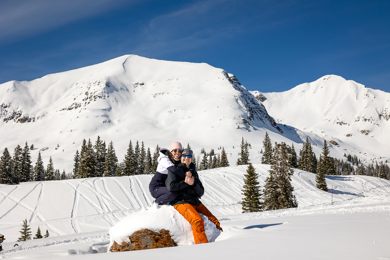 snowy winter excitement surprise proposal on one knee mountains background Crested Butte photographer Gunnison photographers Colorado photography - proposal engagement elopement wedding venue - photo by Mountain Magic Media