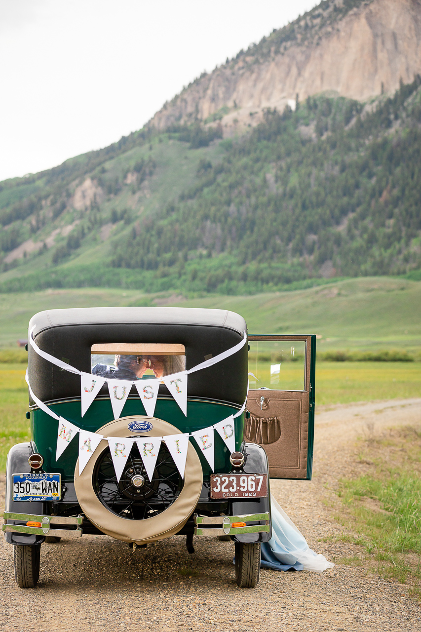 holy smokes blue wedding dress custom florals Crested Butte weddings planner planning photographer Gunnison photographers Colorado photography - proposal engagement elopement wedding venue - photo by Mountain Magic Media