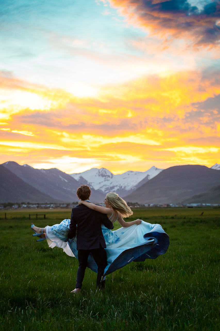 Town Ranch Wedding groom holding bride twirling Crested Butte photographer Gunnison photographers Colorado photography - proposal engagement elopement wedding venue - photo by Mountain Magic Media
