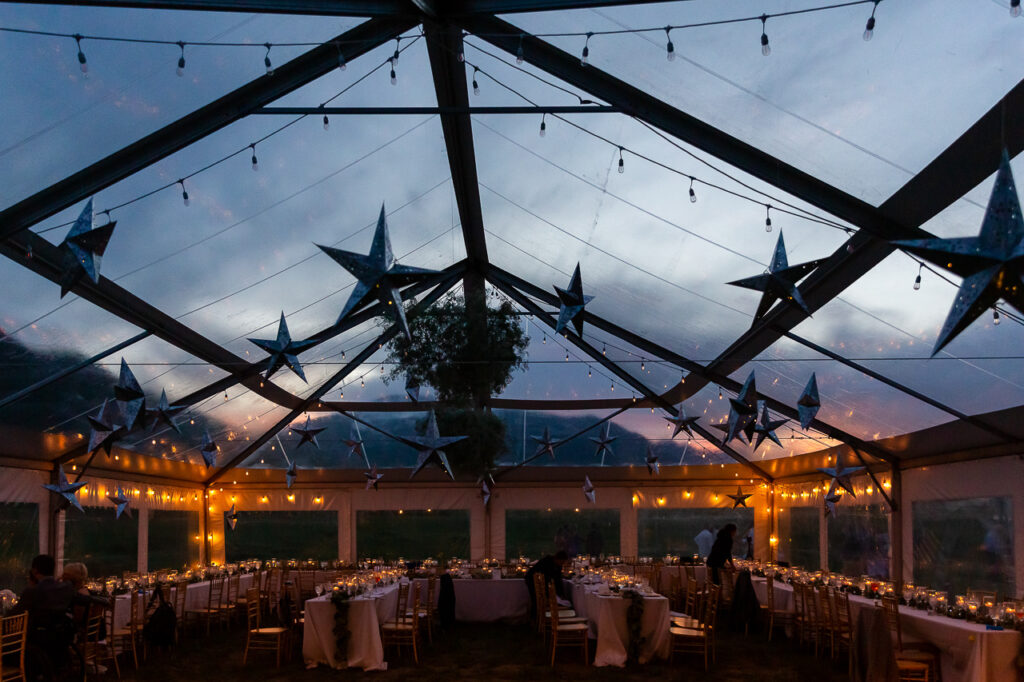 Cement Creek Ranch tented wedding venue in Crested Butte with twilight decor and candle lighting