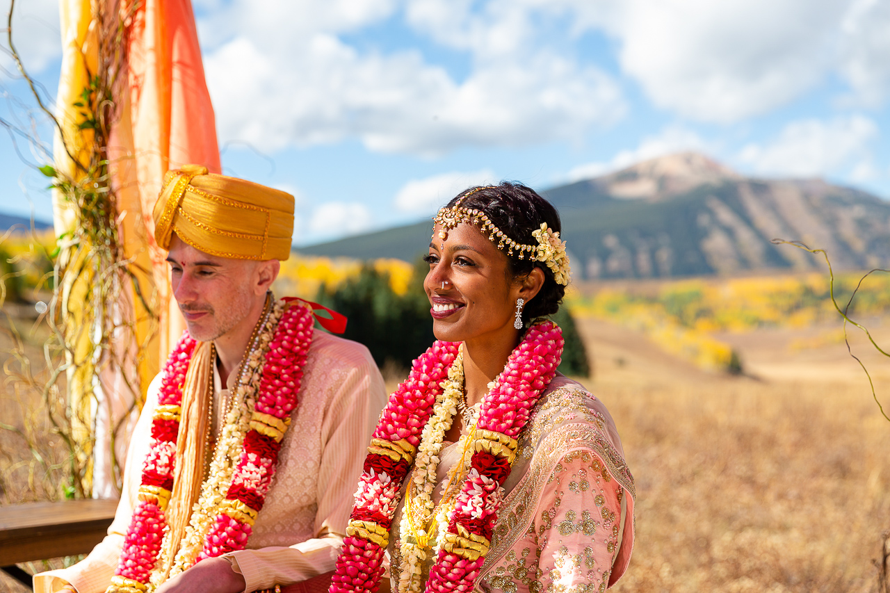 colorful Indian wedding couple newlyweds married marriage ceremony weddings Crested Butte photographer Gunnison photographers Colorado photography - proposal engagement elopement wedding venue - photo by Mountain Magic Media