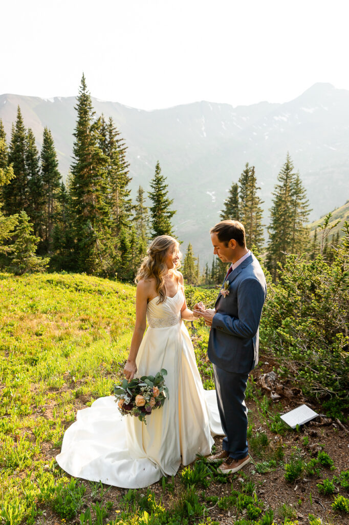 reading private vows wiping tears crying elope Crested Butte photographer Gunnison photographers Colorado photography - proposal engagement elopement wedding venue - photo by Mountain Magic Media