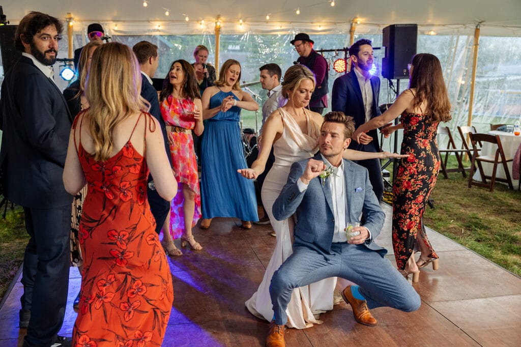 newlyweds dancing Dance Party Wedding Tent Dancefloor Crested Butte Weddings