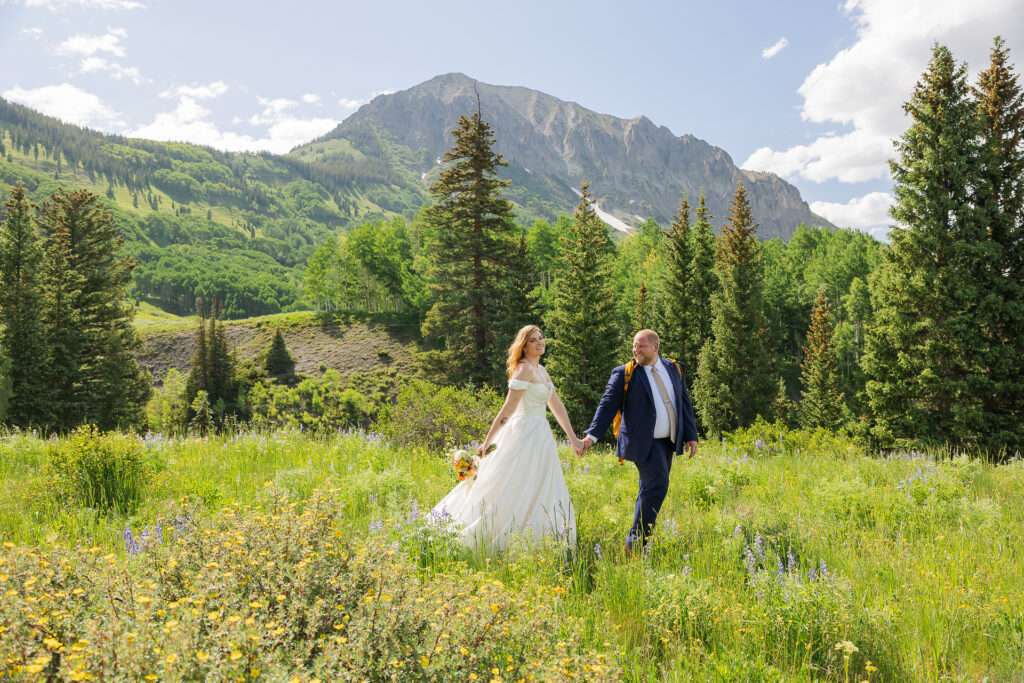 newlyweds adventure near Crested Butte wedding venue Rocky Mountain Biological Laboratory
